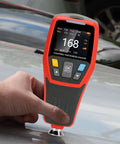 Must-Have Paint Thickness Gauge For Cars With Auto Rotating Display And Ferrous And Non Ferrous Substrate Recognition, 1250 Micron Range And 0.1 Micron Resolution, Zero And Two Point Calibration, Custom High Low Alarms on car panel