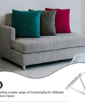 2 Pack Triangular Spring Lift Up Hinges For Sofa Beds And Furniture, hot rolled steel in silver, next to a modern sofa