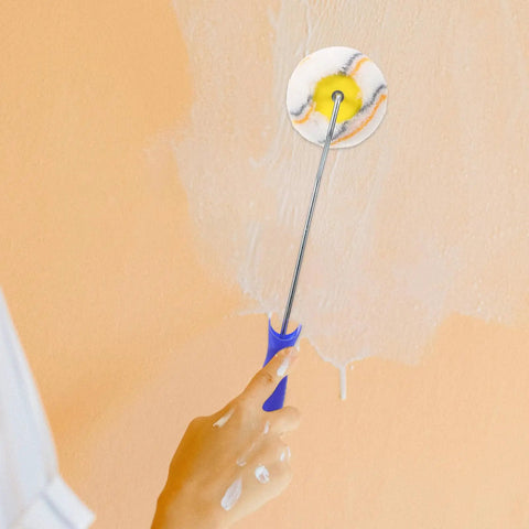 Slick Paint Roller Brush And Corner Edger For Snug Corners Window Trim And Door Frames Dang Handy Tool Saving Sweat On Home Wall Painting Projects in use on peach wall.