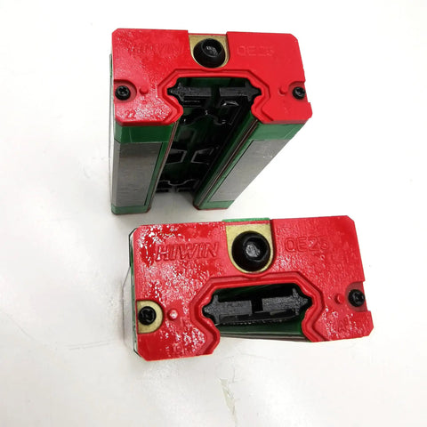 Linear Guide Rail Kit For CNC Machines And 3D Printers QEH20 Series Carriage And Slider Interchangeable Blocks For Smooth Rock Solid High Precision Motion Control In Everyday Automation, two red QEH20 blocks