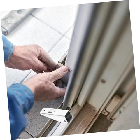 Installation of Heavy Duty Sliding Door Rollers And Low Profile Cabinet Wheels With Slick Ball Bearings for smooth operation.