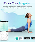 Woman doing yoga next to Smart Scale For Body Weight And Fat Percentage With BMI And Muscle Mass Analysis, app on screen