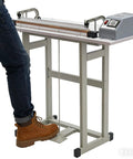22.83-Inch GAZOGJ Heat Sealing Machine, 2-in-1 Plastic Bag Sealer And Cutter in use with foot pedal for easy operation.