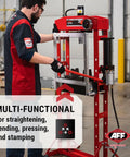 20 Ton Hydraulic Shop Press With Dual Air Motor And 7 Position Bed Height Polycarbonate Shield For Quick Pressing Straightening And Bending In A Pro Grade Welded Frame being used in workshop