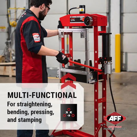 20 Ton Hydraulic Shop Press With Dual Air Motor And 7 Position Bed Height Polycarbonate Shield For Quick Pressing Straightening And Bending In A Pro Grade Welded Frame being used in workshop