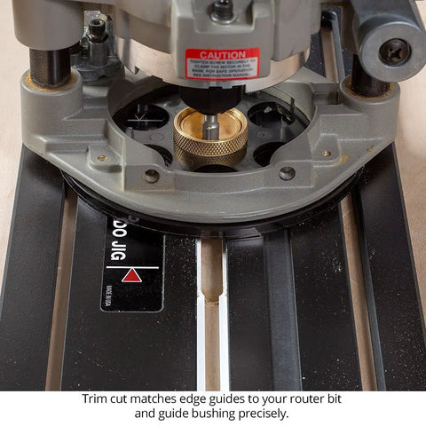 Close-up of Hook Up This Premium Shop Tested 32 Inch Router Dado Jig, showing router bit and guide bushing for precise cutting.