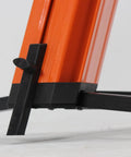 Fat Toad Column Dj Keyboard Stand Two Tier Mic Boom Adapter Sliding Tower close-up of orange aluminum frame and locking mechanism.