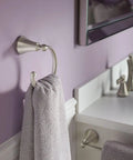 Wynford 24 Inch Single Towel Bar In Brushed Nickel Finish For Bathrooms And Kitchens, Flexible Mounting, with towel hanging in bathroom