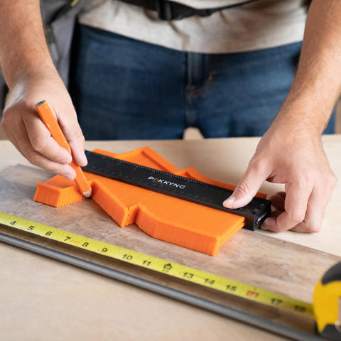 Person using Contour Duplicator With Angle Finder And 10 And 5 Inch Profile Gauges For Perfect Cuts In Woodworking And Tile Projects