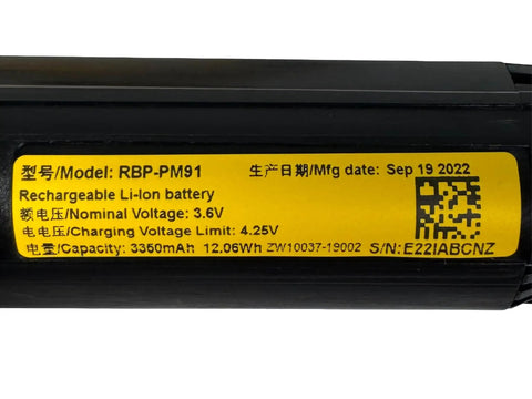 Wireless Barcode Scanner PM9501 DHP910RB With Battery Pack showing model RBP-PM91 specs and manufacturing date
