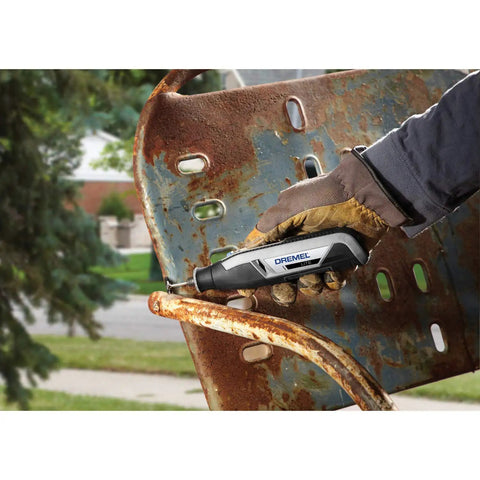 Ultra Compact Four Volt Cordless Rotary Tool Featuring Variable Speed and No Sweat Accessory Swaps used for rust removal on metal.
