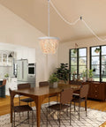 Plug In Wood Beaded Chandelier With 20 Foot Hanging Cord 3 Light Boho Farmhouse Ceiling Fixture For Bedrooms Rustic White Metal Finish Pendant Light Home Decor hanging over dining table in modern room.