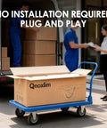 Qnoxlim Full Electric Massage Table With Lift ready for use in delivery box on a cart, no assembly required.