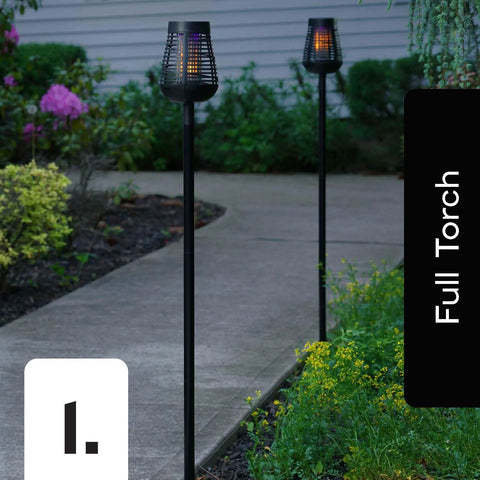 Full view of Solar Insect Killer Torch Bug Zapper And Accent Light For Patio Outdoor Pest Control That Kills Bugs On Contact With Flickering Flame LED Eco Friendly Design along a pathway.
