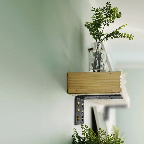 Tough As Nails 2 Pack Triangular Wall Shelf Brackets L Shaped Heavy Duty Corner Supports With Zero Wobble Guarantee For Floating Cabinets Up To 882 Lbs Capacity 320 X 100 Mm, displaying a mounted wooden shelf with a plant.