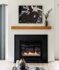 Living room with Faux Linen Sheer Curtains 54 by 63 Inches Set of 2, open weave, grommet veil drapes on both sides of a fireplace