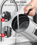 Electric Milk Frother Stainless Steel 8.4oz Capacity Hot And Cold Foam Maker being rinsed under a tap for cleaning