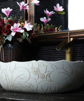 Square Above Counter Bathroom Sink In White Porcelain With Hand Carved Lotus Pattern Grit Proof Surface Easy Peasy Cleaning And A Dope Vintage Vibe That Hits Different On Your Next Vanity Setup, floral design with faucet.