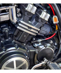 Close-up of motorcycle engine with Universal Go To Gas Inline Fuel Filter With Magnet for One Quarter Inch and Five Sixteenth Inch Fuel Lines