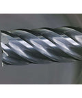 Carbide end mill with 6 flutes and 1/4 in shank, close-up of helical cutting edges