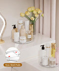 Smooth Spin Bathroom Vanity Tray For Counter 2 Pack 9 Inch Rotary Makeup Organizer with various skincare products and flowers.