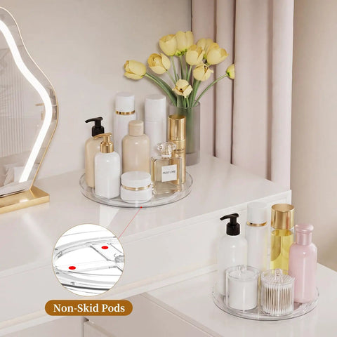 Smooth Spin Bathroom Vanity Tray For Counter 2 Pack 9 Inch Rotary Makeup Organizer with various skincare products and flowers.