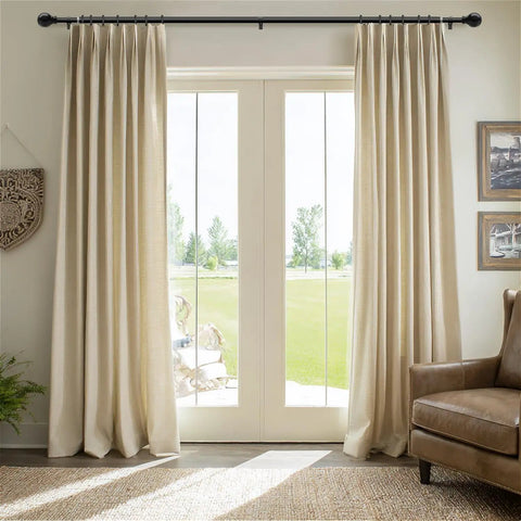 Heavy Duty Black Curtain Rods 72 To 144 Inches 1 Inch Diameter Adjustable Extra Long Blackout Traverse Window Rods in living room.