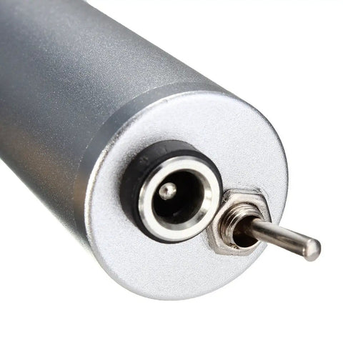 Close-up of Mini Handheld Micro Drill Kit with aluminum body and power switch, part of 15 piece bit set for DIY projects and crafts.