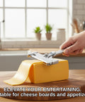 Built Tough Adjustable Cheese Slicer With Sharp Wire Cutter And Super Clutch Mini Silicone Tongs For Seamless Block Slicing showing cheese being sliced.