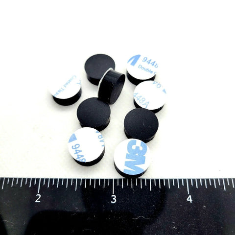 Image of One Half Inch Round Silicone Rubber Bumper Feet Three Sixteenths Of An Inch Thick Adhesive Backed Spacer Pads next to a ruler