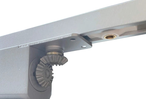 Close-up view of the concealed door closer cam drive mechanism. Concealed Door Closer Up To 220 Lbs For Heavy Doors Built Tough Non Handed With Dual Speed Control And Hidden In Door Frame Standard Hold Open Function Fits 1.93 Inch Thick Doors Invisible Cam Drive Closer.