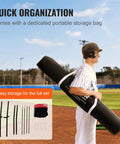 Person carrying 7x7 Ft Baseball And Softball Practice Net Portable Training Net For Hitting Batting Catching And Pitching Backstop With Carry Bag Ideal For Backyard And Field Use on a baseball field