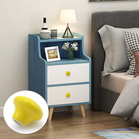 Snag These Hella Durable Yellow Ceramic Cabinet Knobs 10 Pack 32mm Round Drawer Pulls With Full Mounting Hardware Set For Kitchen Cupboard Make Your Place Look Absolutely Lit on a nightstand.