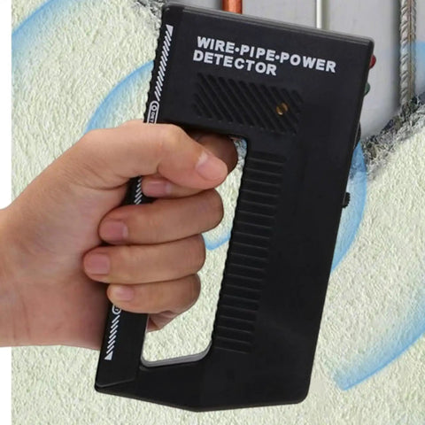 Close-up of a hand holding a Metal Detector - Wire Finder Wall Scanner, Stud Sensor Hardware Tool against a wall.