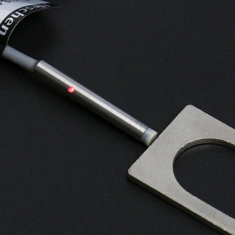 Close-up of M4 Inductive Proximity Sensor Switch Workhorse with 1.5mm sensing distance and 200 cm cable on black background.