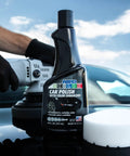 Black Car Polish 16 Oz For Deep Gloss And Scratch Repair On Dark Paints bottle with buffer and pad on shiny car