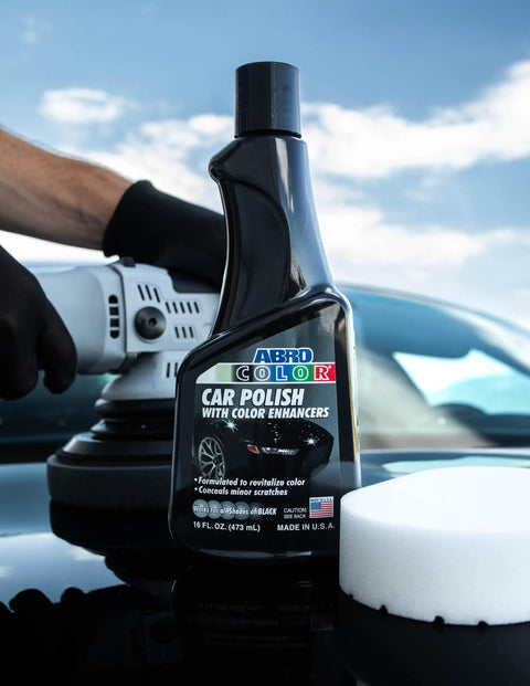 Black Car Polish 16 Oz For Deep Gloss And Scratch Repair On Dark Paints bottle with buffer and pad on shiny car