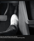 Heavy Duty Kickproof Console Guard For Tesla Model Y Juniper And Model 3 Highland shown installed near foot pedal area.