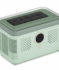 Sleek Countertop Ice Maker With Zero Sweat One Touch Operation And Smooth Self Cleaning Design Blazing Fast Cube Production at an angle revealing controls.
