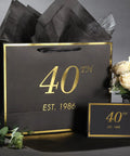 40th Birthday Gift Bag With Card And Tissue Paper For Men And Women 1986, elegant black and gold design, 13-inch, with tissue paper and card