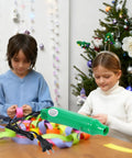 Children using Hot Air Heat Gun for Crafting and DIY Projects, 110V 300W Handheld near Christmas tree, green, portable, with cord and stand