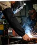 Heat Resistant Welding Sleeves Built For The Daily Grind Provide Flame Proof Arm Guards With.Snug Hook And Loop Closure To Keep Hands And Forearms Covered While You Grind In Black, worn during welding.