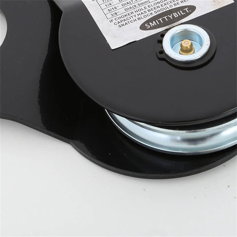 Beefy Heavy Duty Snatch Block For Winches 17,600 Lb Capacity Universal Fit Seven Thirty Two To Three Eighths Inch Cable Greasable Bearing Black Powder Coat Off Road Recovery Tool close-up