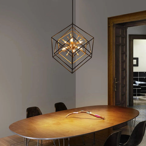 Six Light Geometric Farmhouse Chandelier With Adjustable Height over dining table, black and vintage copper finish, modern setting