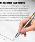 Dope Mohs Hardness Test Pen Set Kit, 2 To 9 Level Scratch Tester With Storage Box For Mineral Glass Tile Concrete And Coating Hardness Testing, Stainless Steel 155mm Pens With Dual End Tips, hand using pen on glass