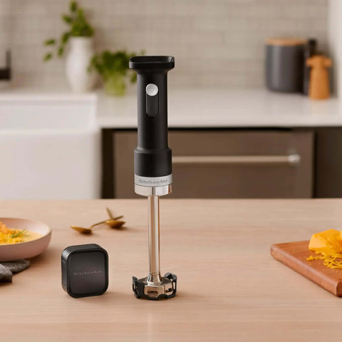Cordless Hand Blender With 12 Volt Battery Operated Kitchen Tool Lightweight Smoothie Wand For Purees And Dices Easily on kitchen counter.