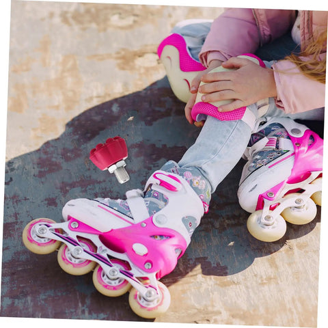 Close-up of quad skates with attached Toe Stops For Quad Skates, Rubber Roller Skate Brakes Plugs, Non-Marking Stoppers, designed for quick braking.