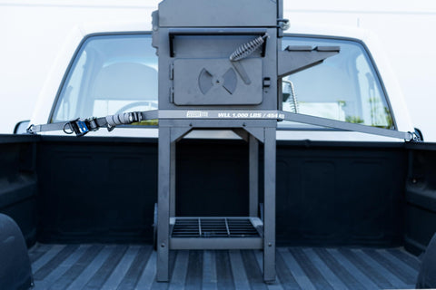 Beefy 4 Pack Ratchet Tie Down Straps One And One Quarter Inch By 16 Foot securing cargo in truck bed with J hooks visible