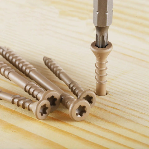 Badass Heavy Duty Deck Screws Assortment Kit 96 Piece Exterior Wood Fasteners with Torx drive in wood surface.