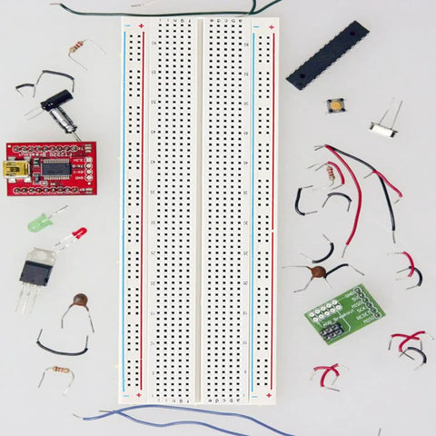 Triple 830 Point Solderless Breadboard Kit For DIY Makers Prototyping Arduino And Raspberry Pi Projects, surrounded by components.